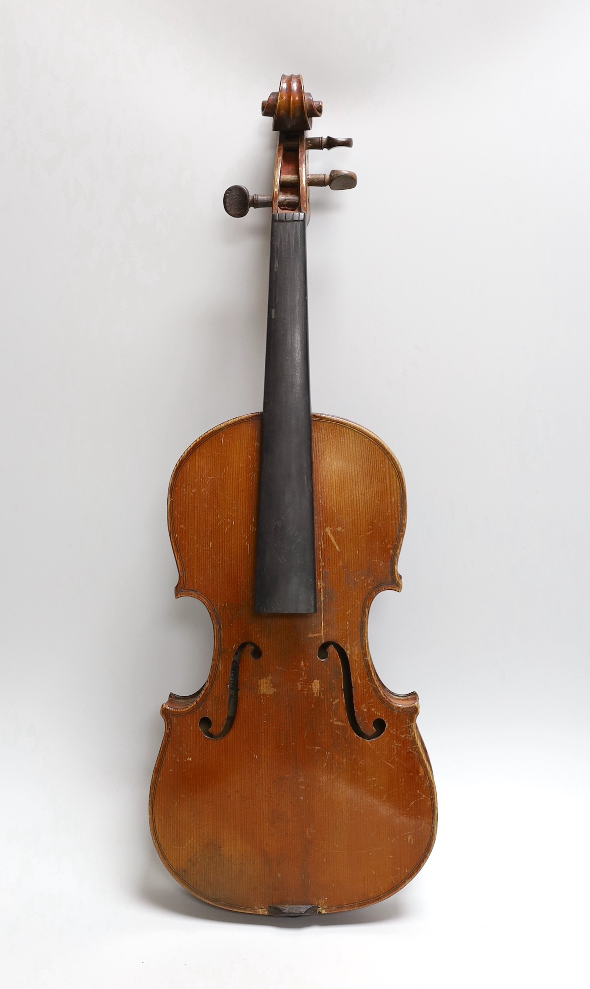 A cased three quarter size violin, labelled E.Coiffier, 56cms long